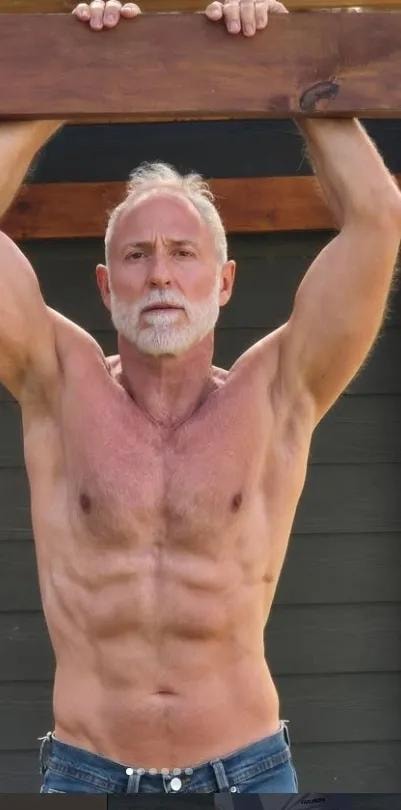 Fit older man demonstrating strength and health